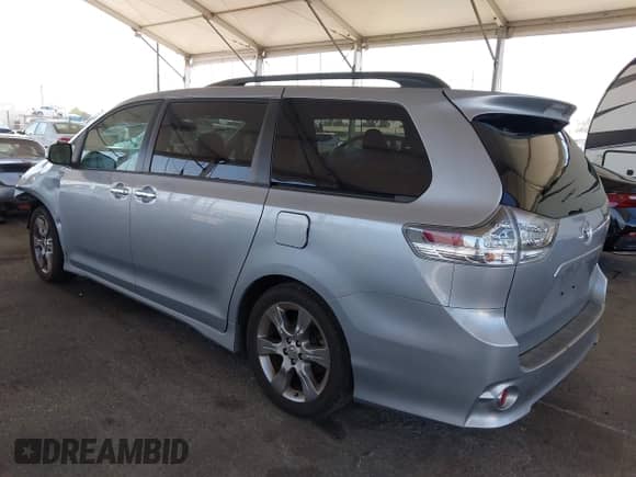 2014 Toyota Sienna SE with VIN 5TDXK3DC8ES485443, listed as a IAAI auction lot 42685176 with 91,853 mi miles and . Bid and sale history available at DreamBid. Image 3.
