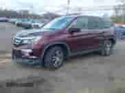 2017 Honda Pilot EX-L with VIN 5FNYF6H74HB040889, listed as a IAAI auction lot 42040094 with 84,001 mi miles and . Bid and sale history available at DreamBid. Image 2.