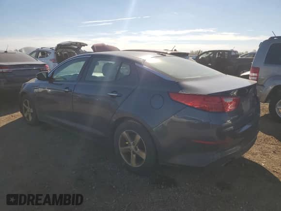 2015 Kia Optima LX with VIN KNAGM4A72F5565817, listed as a Copart auction lot 82739495 with 193,431 mi miles and Clean title. Bid and sale history available at DreamBid. Image 2.
