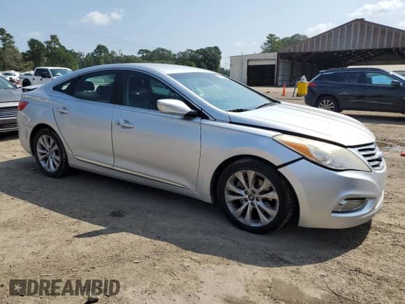 2014 Hyundai Azera с VIN KMHFG4JG6EA368463, выставлен на аукционе Copart как лот 69882895 с пробегом 143 776 миль миль и Списание • Salvage title. История ставок и продаж доступна на DreamBid. Изображение 4.