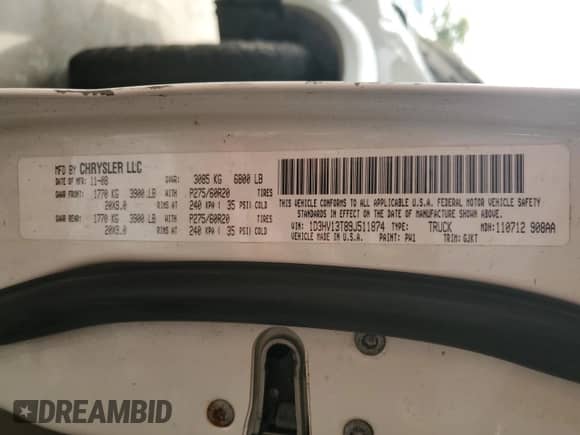 2009 Dodge 1500 Laramie z VIN 1D3HV13T89J511874, wystawiony jako Copart lot #65673085 z przebiegiem Nie podano mil oraz Szkoda całkowita • Salvage title. Historia ofert i sprzedaży dostępna na DreamBid. Obrazek 12.