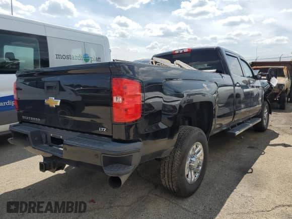 2018 Chevrolet Silverado 3500HD LTZ с VIN 1GC4K0EY0JF191167, выставлен на аукционе Copart как лот 67345594 с пробегом 70 354 миль миль и Списание • Salvage title. История ставок и продаж доступна на DreamBid. Изображение 3.