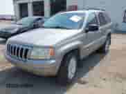 2001 Jeep Grand Cherokee Limited with VIN 1J4GW58N41C574010, listed as a IAAI auction lot 42858569 with 178,434 mi miles and . Bid and sale history available at DreamBid. Image 2.