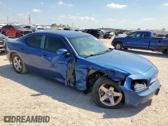 2010 Dodge Charger with VIN 2B3CA4CD5AH108922, listed as a Copart auction lot 70945145 with 124,067 mi miles and Salvage title. Bid and sale history available at DreamBid. Image 4.