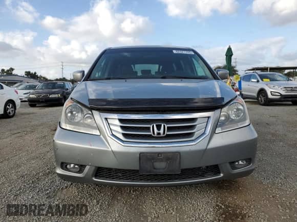 2009 Honda Odyssey Touring with VIN 5FNRL38989B040375, listed as a Copart auction lot 82321765 with 167,692 mi miles and Salvage title. Bid and sale history available at DreamBid. Image 5.