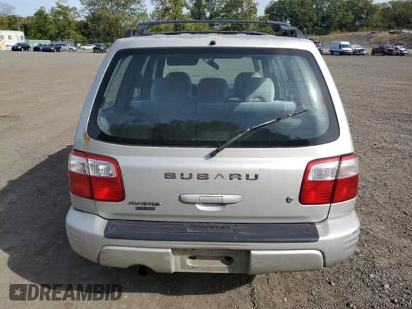 2001 Subaru Forester S with VIN JF1SF65661H767755, listed as a Copart auction lot 84579685 with 212,303 mi miles and Salvage title. Bid and sale history available at DreamBid. Image 6.