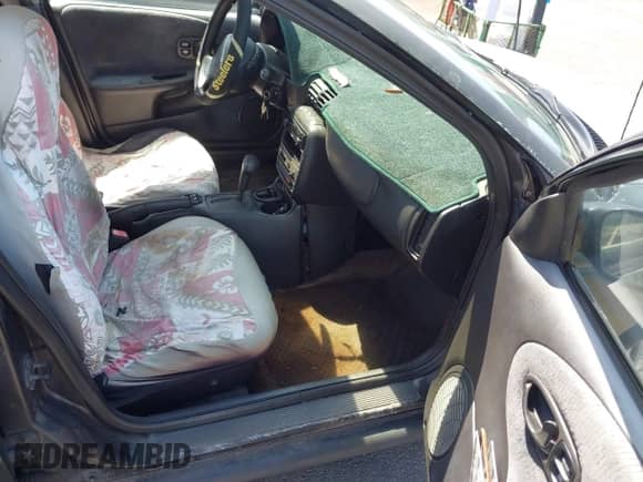 1999 Saturn SL z VIN 1G8ZK5274XZ351289, wystawiony jako IAAI lot #41734679 z przebiegiem 140 006 mil mil oraz . Historia ofert i sprzedaży dostępna na DreamBid. Obrazek 5.