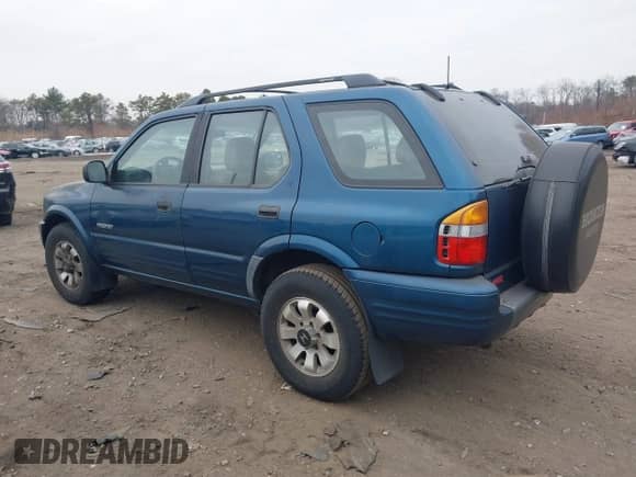 2000 Honda Passport LX with VIN 4S6DM58WXY4414843, listed as a IAAI auction lot 41325250 with 100,909 mi miles and . Bid and sale history available at DreamBid. Image 3.