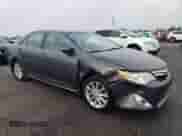 2012 Toyota Camry XLE z VIN 4T1BF1FK0CU070340, wystawiony jako Copart lot #81773185 z przebiegiem 108 717 mil mil oraz Szkoda całkowita • Salvage title. Historia ofert i sprzedaży dostępna na DreamBid. Obrazek 4.
