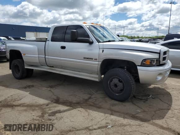 2001 Dodge RAM с VIN 1B7MF33W61J551711, выставлен на аукционе Copart как лот 58213265 с пробегом 104 586 миль миль и Чистый • Clean title. История ставок и продаж доступна на DreamBid. Изображение 4.