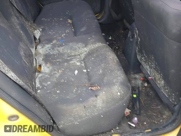 2003 Dodge Neon Highline z VIN 1B3ES46C83D244096, wystawiony jako IAAI lot #41899409 z przebiegiem 145 659 mil mil oraz . Historia ofert i sprzedaży dostępna na DreamBid. Obrazek 20.