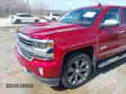 2018 Chevrolet Silverado 1500 High Country with VIN 3GCUKTEJ4JG293333, listed as a IAAI auction lot 41727907 with 60,988 mi miles and . Bid and sale history available at DreamBid. Image 2.