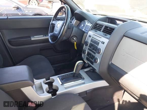 2008 Mercury Mariner with VIN 4M2CU91198KJ24730, listed as a IAAI auction lot 43341107 with 158,521 mi miles and . Bid and sale history available at DreamBid. Image 5.