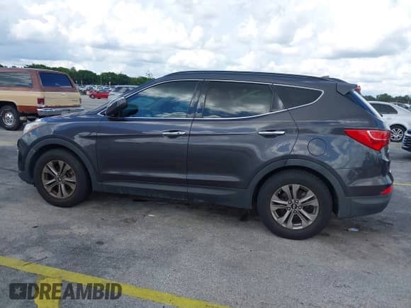 2016 Hyundai Santa Fe with VIN 5XYZUDLB6GG337079, listed as a IAAI auction lot 43424247 with Not provided miles and . Bid and sale history available at DreamBid. Image 14.