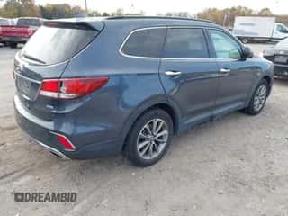 2017 Hyundai Santa Fe SE z VIN KM8SMDHF5HU174837, wystawiony jako IAAI lot #43557792 z przebiegiem 154 702 mil mil oraz . Historia ofert i sprzedaży dostępna na DreamBid. Obrazek 4.