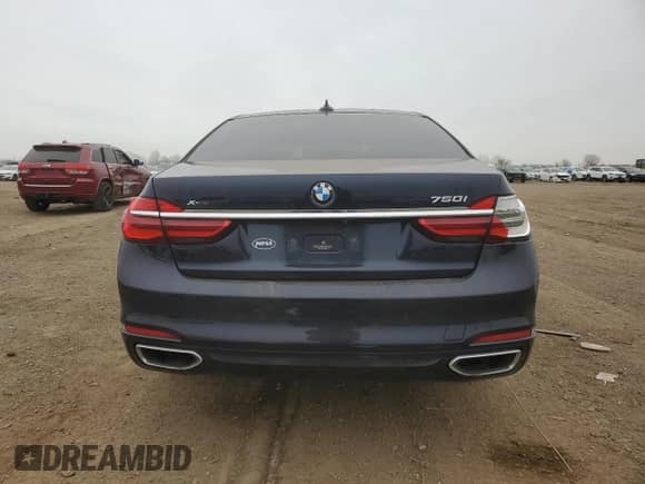 2016 BMW 7 Series 750i xDrive with VIN WBA7F2C52GG417795, listed as a Copart auction lot 51043725 with Not provided miles and Salvage title. Bid and sale history available at DreamBid. Image 6.