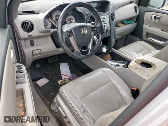 2011 Honda Pilot EX-L z VIN 5FNYF3H65BB037920, wystawiony jako Copart lot #59944065 z przebiegiem 214 929 mil mil oraz Szkoda całkowita • Salvage title. Historia ofert i sprzedaży dostępna na DreamBid. Obrazek 8.