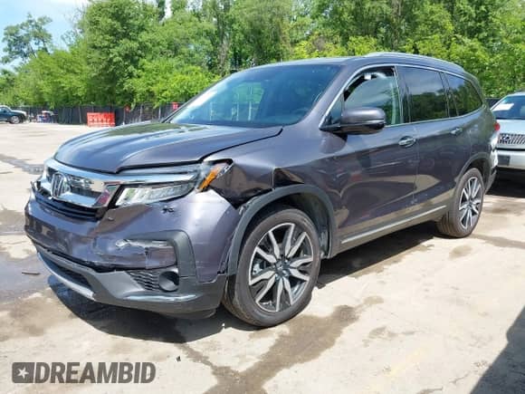 2021 Honda Pilot Touring 7-Passenger with VIN 5FNYF6H66MB081767, listed as a IAAI auction lot 42221152 with 74,029 mi miles and . Bid and sale history available at DreamBid. Image 18.