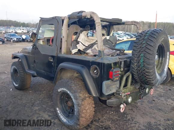 1997 Jeep Wrangler with VIN IJ4FY19S7VP440254, listed as a IAAI auction lot 41220711 with 218,398 mi miles and . Bid and sale history available at DreamBid. Image 3.