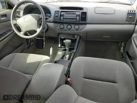 2005 Toyota Camry LE z VIN 4T1BE32K75U060475, wystawiony jako Copart lot #83996795 z przebiegiem Nie podano mil oraz Szkoda całkowita • Salvage title. Historia ofert i sprzedaży dostępna na DreamBid. Obrazek 8.