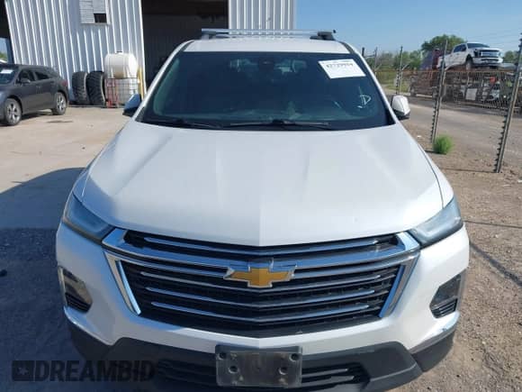 2022 Chevrolet Traverse LT Cloth z VIN 1GNERGKW1NJ147734, wystawiony jako IAAI lot #42729954 z przebiegiem 62 786 mil mil oraz . Historia ofert i sprzedaży dostępna na DreamBid. Obrazek 12.
