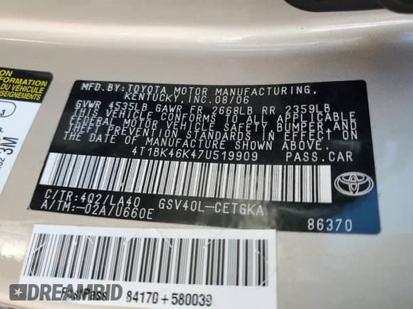2007 Toyota Camry LE z VIN 4T1BK46K47U519909, wystawiony jako Copart lot #81109575 z przebiegiem 124 401 mil mil oraz Szkoda całkowita • Salvage title. Historia ofert i sprzedaży dostępna na DreamBid. Obrazek 12.