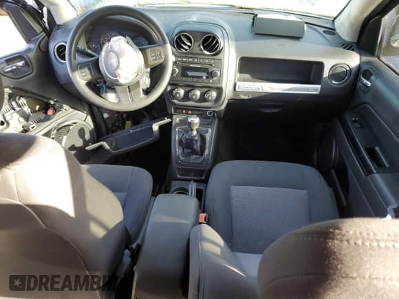 2014 Jeep Compass Sport with VIN 1C4NJCBA2ED507850, listed as a Copart auction lot 85699295 with 104,728 mi miles and Non repairable. Bid and sale history available at DreamBid. Image 8.