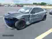 2020 Dodge Charger Scat Pack with VIN 2C3CDXGJ8LH221455, listed as a IAAI auction lot 42885847 with 64,813 mi miles and . Bid and sale history available at DreamBid. Image 2.