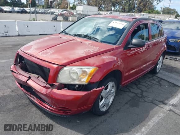 2009 Dodge Caliber SXT with VIN 1B3HB48A09D200014, listed as a IAAI auction lot 43213766 with 73,272 mi miles and . Bid and sale history available at DreamBid. Image 2.