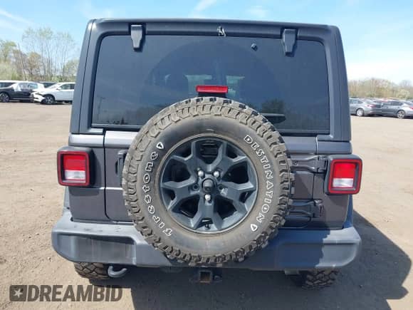 2021 Jeep Wrangler Unlimited Willys with VIN 1C4HJXDG1MW672507, listed as a IAAI auction lot 42084805 with 59,943 mi miles and . Bid and sale history available at DreamBid. Image 16.