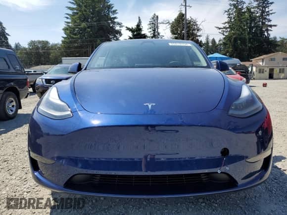 2024 Tesla Model Y Long Range with VIN 7SAYGDEEXRF129763, listed as a Copart auction lot 70710374 with 333 mi miles and Salvage title. Bid and sale history available at DreamBid. Image 5.