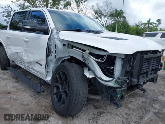 2021 Ram 1500 Laramie z VIN 1C6RREJT7MN828162, wystawiony jako IAAI lot #43386377 z przebiegiem 65 878 mil mil oraz . Historia ofert i sprzedaży dostępna na DreamBid. Obrazek 6.