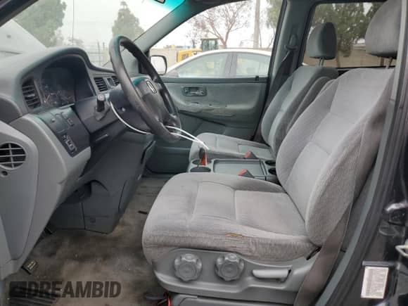 2004 Honda Odyssey LX with VIN 5FNRL18574B137609, listed as a Copart auction lot 68292805 with 172,873 mi miles and Salvage title. Bid and sale history available at DreamBid. Image 7.