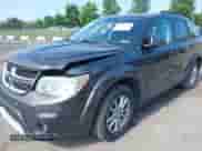 2017 Dodge Journey SXT with VIN 3C4PDDBG4HT540566, listed as a IAAI auction lot 43061099 with 140,130 mi miles and . Bid and sale history available at DreamBid. Image 2.
