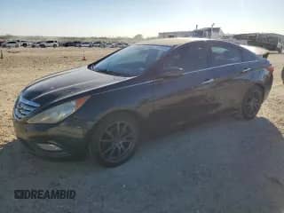 2011 Hyundai Sonata Limited с VIN 5NPEC4AC9BH255037, выставлен на аукционе Copart как лот 86900634 с пробегом 216 014 миль миль и Списание • Salvage title. История ставок и продаж доступна на DreamBid. Изображение 1.