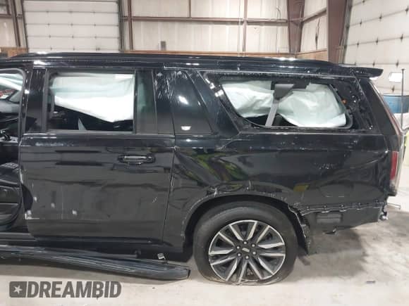 2023 Cadillac Escalade ESV 4WD Sport Platinum with VIN 1GYS4RKL1PR156900, listed as a IAAI auction lot 41740946 with 99,999 mi miles and . Bid and sale history available at DreamBid. Image 21.