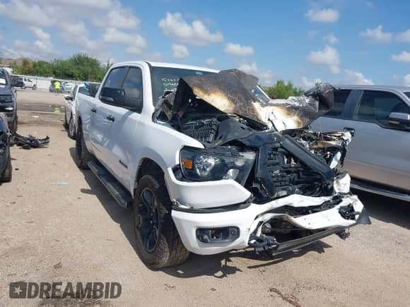 2023 Ram 1500 Big Horn with VIN 1C6SRFMT3PN636003, listed as a IAAI auction lot 42362439 with Not provided miles and . Bid and sale history available at DreamBid. Image 1.