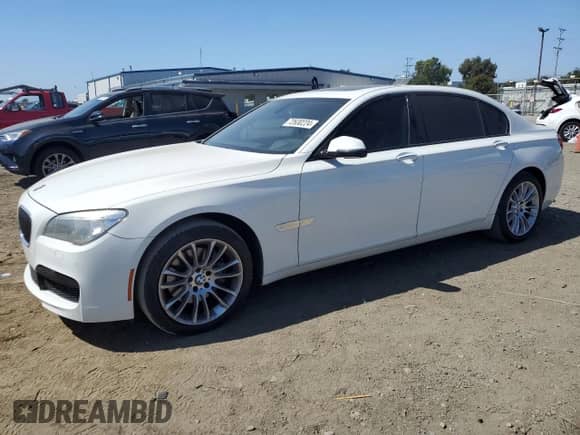 2015 BMW 7 Series with VIN WBAYG6C59FD383685, listed as a Copart auction lot 72630224 with 157,780 mi miles and Salvage title. Bid and sale history available at DreamBid. Image 1.