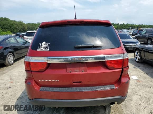 2011 Dodge Durango Express with VIN 1D4RD2GG5BC617117, listed as a Copart auction lot 63713735 with 130,660 mi miles and Salvage title. Bid and sale history available at DreamBid. Image 6.
