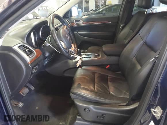 2012 Jeep Grand Cherokee Limited z VIN 1C4RJFBG8CC292498, wystawiony jako Copart lot #71521035 z przebiegiem 167 955 mil mil oraz Szkoda całkowita • Salvage title. Historia ofert i sprzedaży dostępna na DreamBid. Obrazek 7.