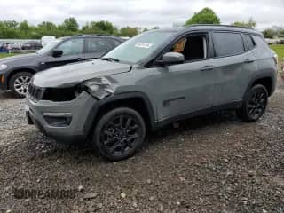 2021 Jeep Compass Upland with VIN 3C4NJDAB0MT603176, listed as a Copart auction lot 54014174 with 74,295 mi miles and Salvage title. Bid and sale history available at DreamBid. Image 1.
