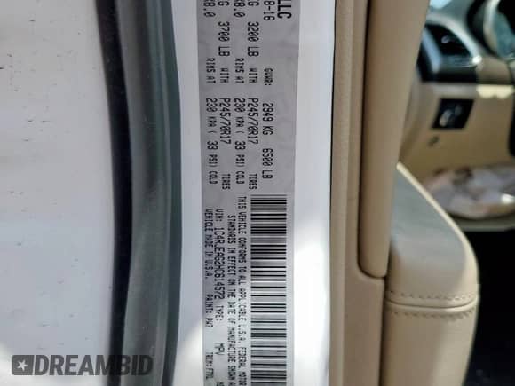 2017 Jeep Grand Cherokee Laredo with VIN 1C4RJEAG2HC614572, listed as a Copart auction lot 67870085 with 123,868 mi miles and Salvage title. Bid and sale history available at DreamBid. Image 12.