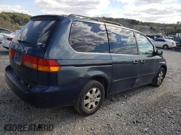 2003 Honda Odyssey EX с VIN 5FNRL18693B108796, выставлен на аукционе Copart как лот 85928265 с пробегом Не указан миль и Списание • Salvage title. История ставок и продаж доступна на DreamBid. Изображение 3.