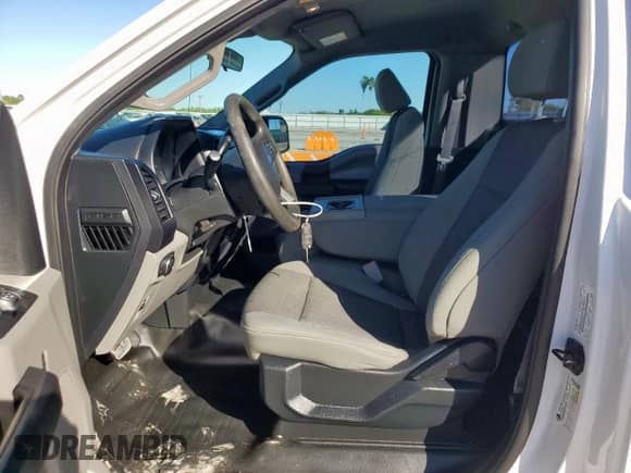 2020 Ford F-150 XL with VIN 1FTMF1EB1LFA38533, listed as a Copart auction lot 90881205 with 186,118 mi miles and Clean title. Bid and sale history available at DreamBid. Image 7.