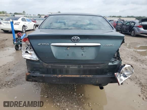 2002 Toyota Camry LE z VIN 4T1BE32K32U543876, wystawiony jako Copart lot #82151065 z przebiegiem Nie podano mil oraz Szkoda całkowita • Salvage title. Historia ofert i sprzedaży dostępna na DreamBid. Obrazek 6.
