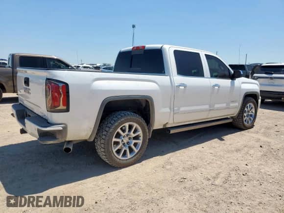 2016 GMC Sierra 1500 Denali z VIN 3GTU2PEJ1GG371793, wystawiony jako Copart lot #67460875 z przebiegiem 231 730 mil mil oraz Czysty tytuł • Clean title. Historia ofert i sprzedaży dostępna na DreamBid. Obrazek 3.