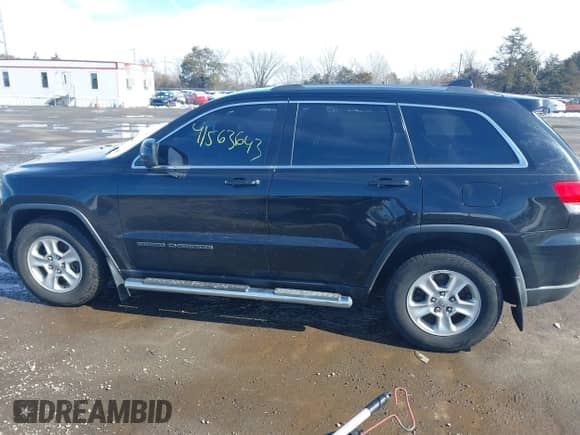 2017 Jeep Grand Cherokee Laredo with VIN 1C4RJEAGXHC685888, listed as a IAAI auction lot 41563643 with 193,997 mi miles and . Bid and sale history available at DreamBid. Image 14.