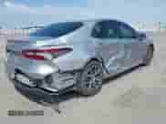 2021 Toyota Camry Hybrid XLE with VIN 4T1F31AK5MU565376, listed as a IAAI auction lot 42687616 with 57,880 mi miles and . Bid and sale history available at DreamBid. Image 4.