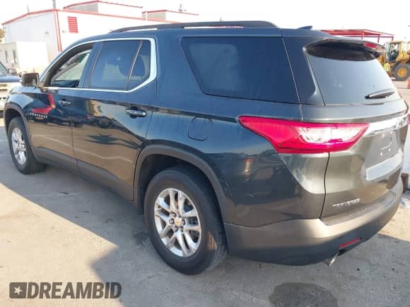 2021 Chevrolet Traverse LT Cloth z VIN 1GNERGKW2MJ169045, wystawiony jako IAAI lot #42935055 z przebiegiem 64 272 mil mil oraz . Historia ofert i sprzedaży dostępna na DreamBid. Obrazek 3.