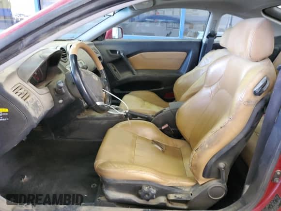 2006 Hyundai Tiburon GT with VIN KMHHN65F06U212592, listed as a Copart auction lot 71478344 with 121,574 mi miles and Salvage title. Bid and sale history available at DreamBid. Image 7.